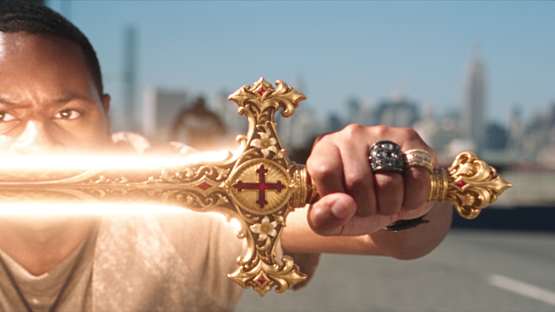 Richard holding a golden sword in The Only Weapon